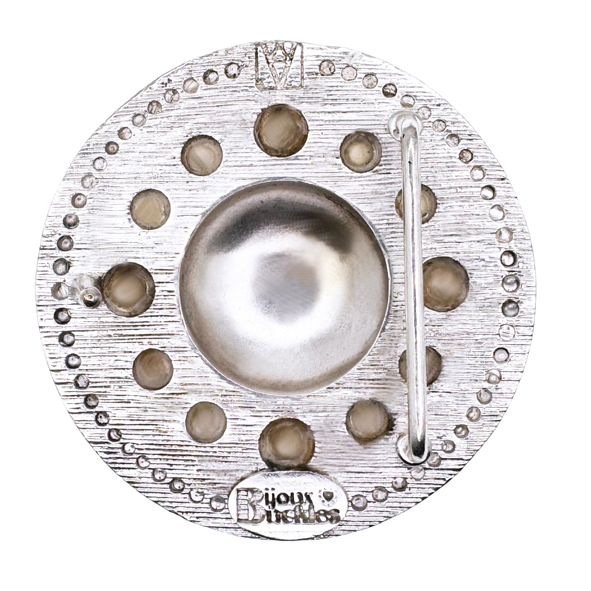 BACK OF ROUND SILVER BELT BUCKLE WITH PEARL ACCENTS