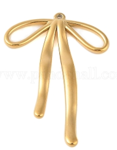 Gold Bow shaped charm on a white background