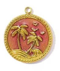 Gold charm with enamel and palm tree design on a white background