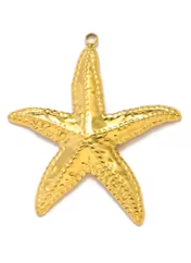 Gold starfish charm on a white background
