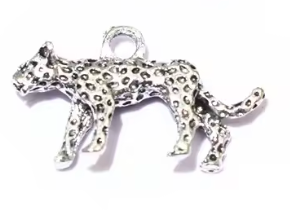 Silver leopard charm on a white background