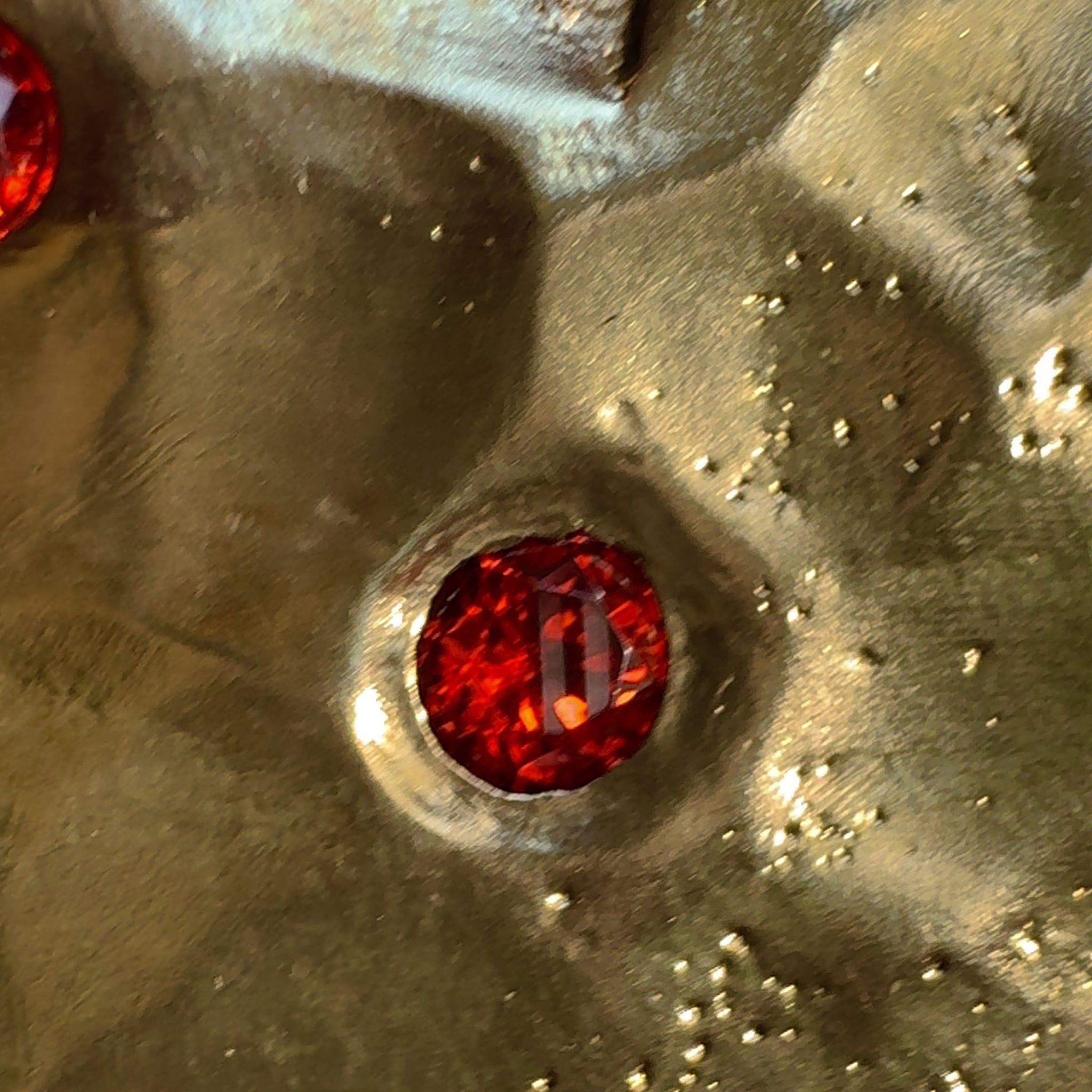 Cast heart buckle with red gemstones 